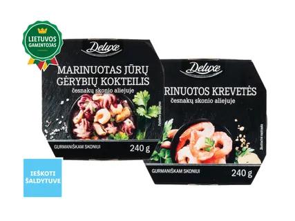 DELUXE Marinuotos baltakojės blyškiosios krevetės arba marinuotas jūrų gėrybių kokteilis